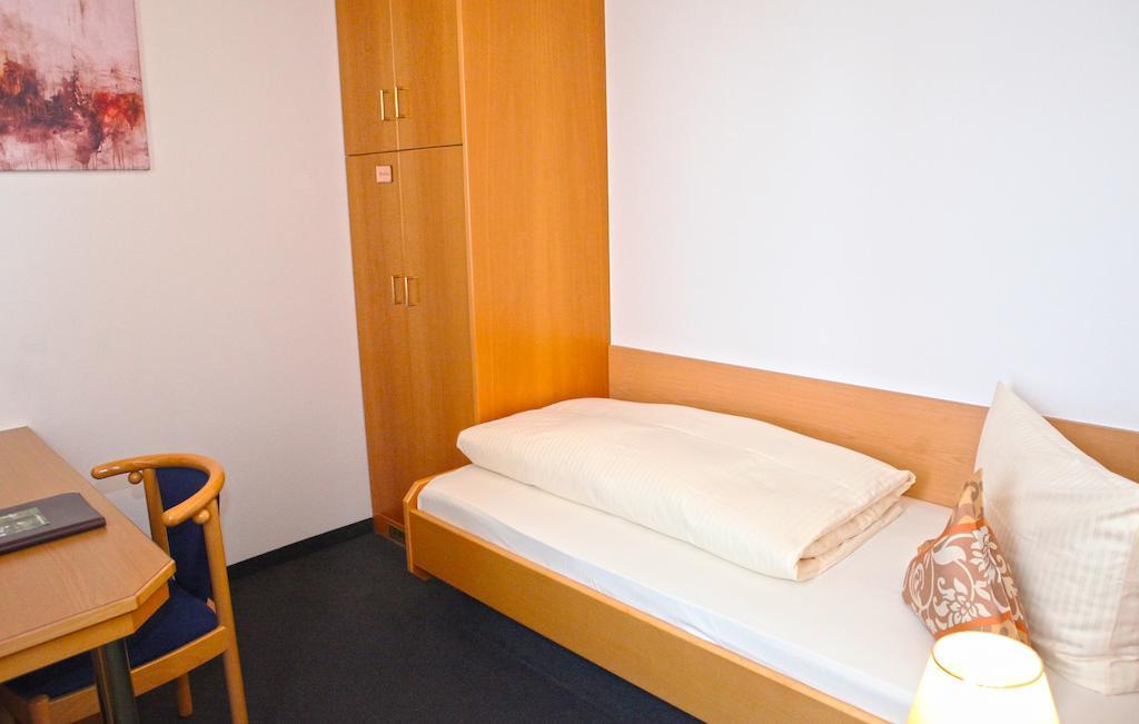 Hotel Am Ostpark Neubiberg Pokoj fotografie